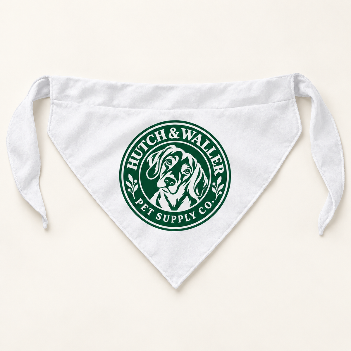 White dog bandana with green Hutch & Waller badge