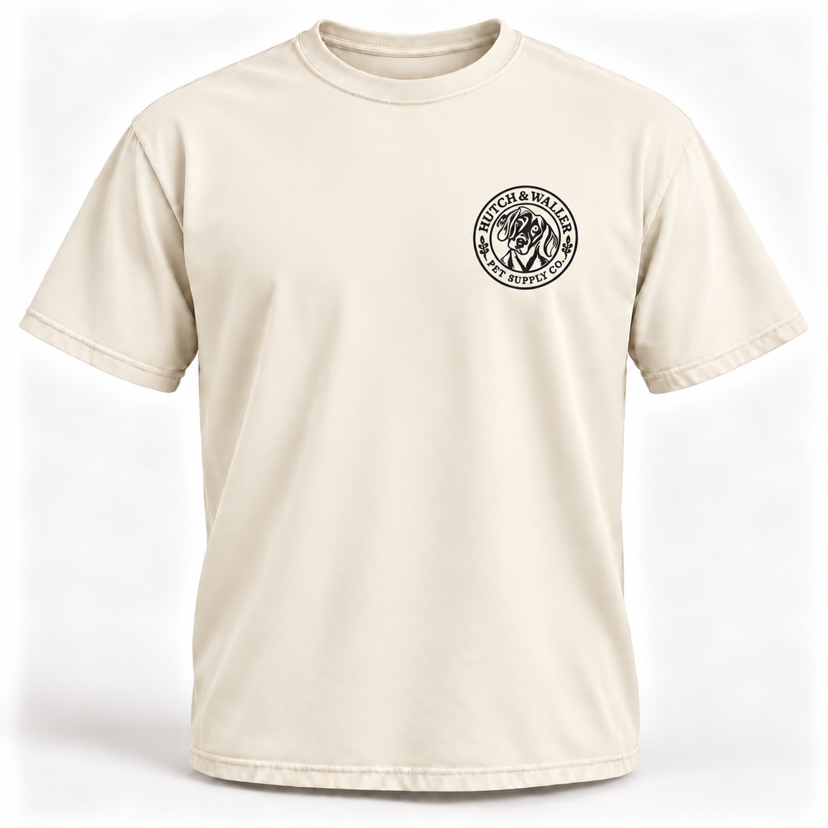 Hutch & Waller Classic Badge T-Shirt in Ivory, black single-color left-chest badge, revised mockup