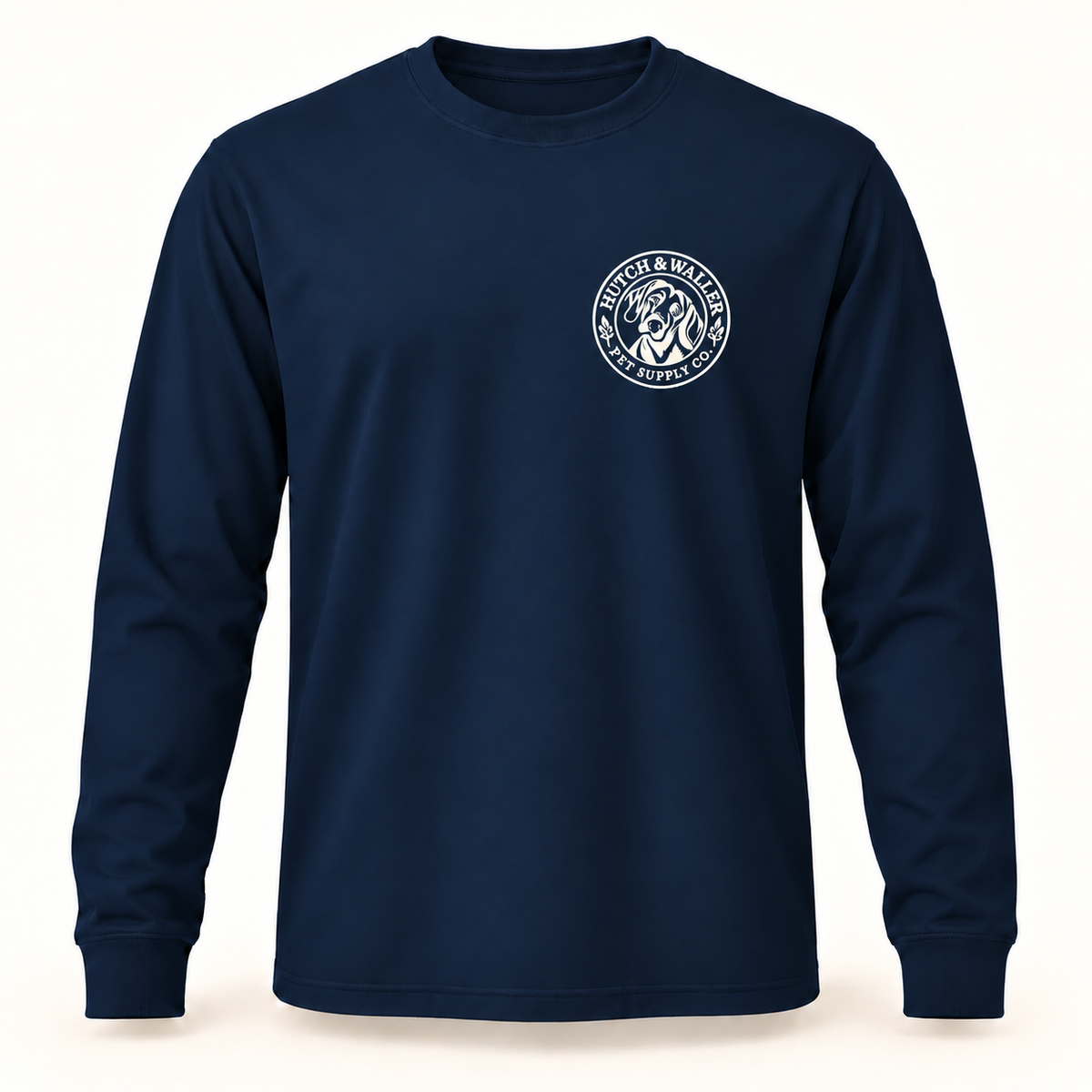 Hutch & Waller Classic Badge Long-Sleeve Tee in Navy, white single-color left-chest badge, revised mockup